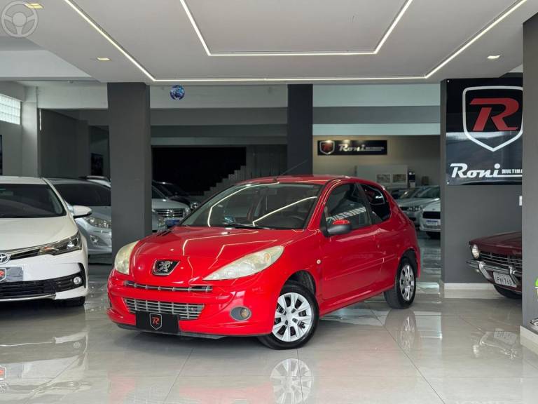 PEUGEOT - 207 1.4 XR SPORT 8V FLEX 2P MANUAL - 2011/2012 - VERMELHA - R$ 24.990,00